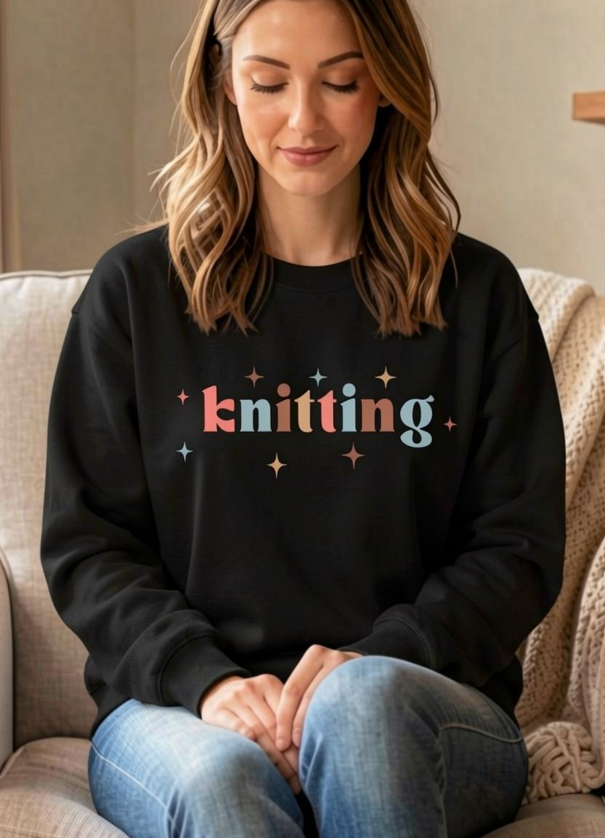 woman wearing black tshirt with knitting written across front
