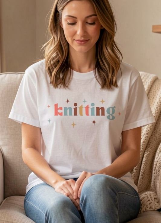 woman wearing white tshirt with knitting written across front